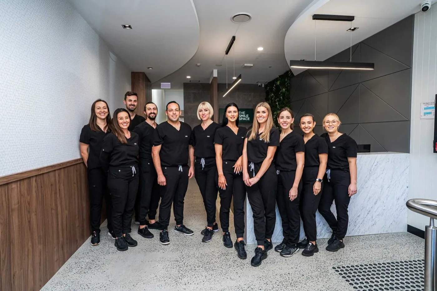 The Smile Space team standing together in the clinic
