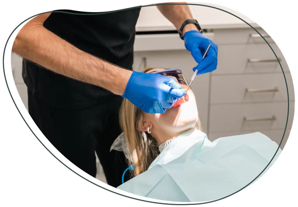 A dentist examining a patient’s teeth